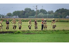 Brandweer redt paard uit water Berkhout