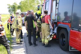 Man in scootmobiel uit sloot getrokken door omstanders